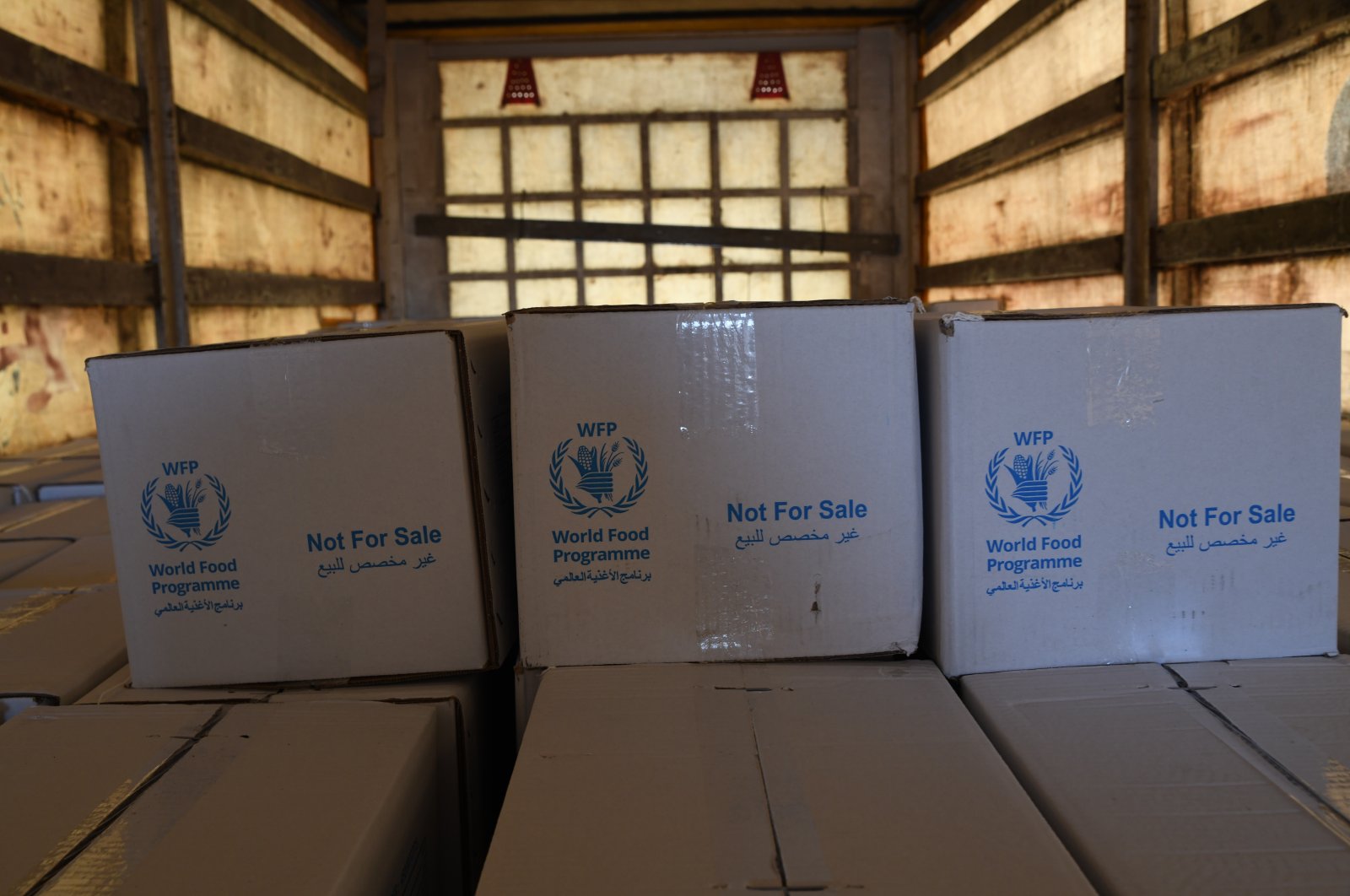 Trucks loaded with humanitarian aid provided by the United Nations World Food Programme enter Northern Syria through Bab al-Hawa crossing, June 22, 2021. (REUTERS Photo)
