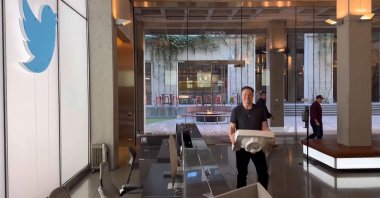This screenshot from a video posted on Twitter by Elon Musk shows himself carrying a sink to the Twitter HQ, San Francisco, U.S., Oct. 26, 2022. (AFP Photo)