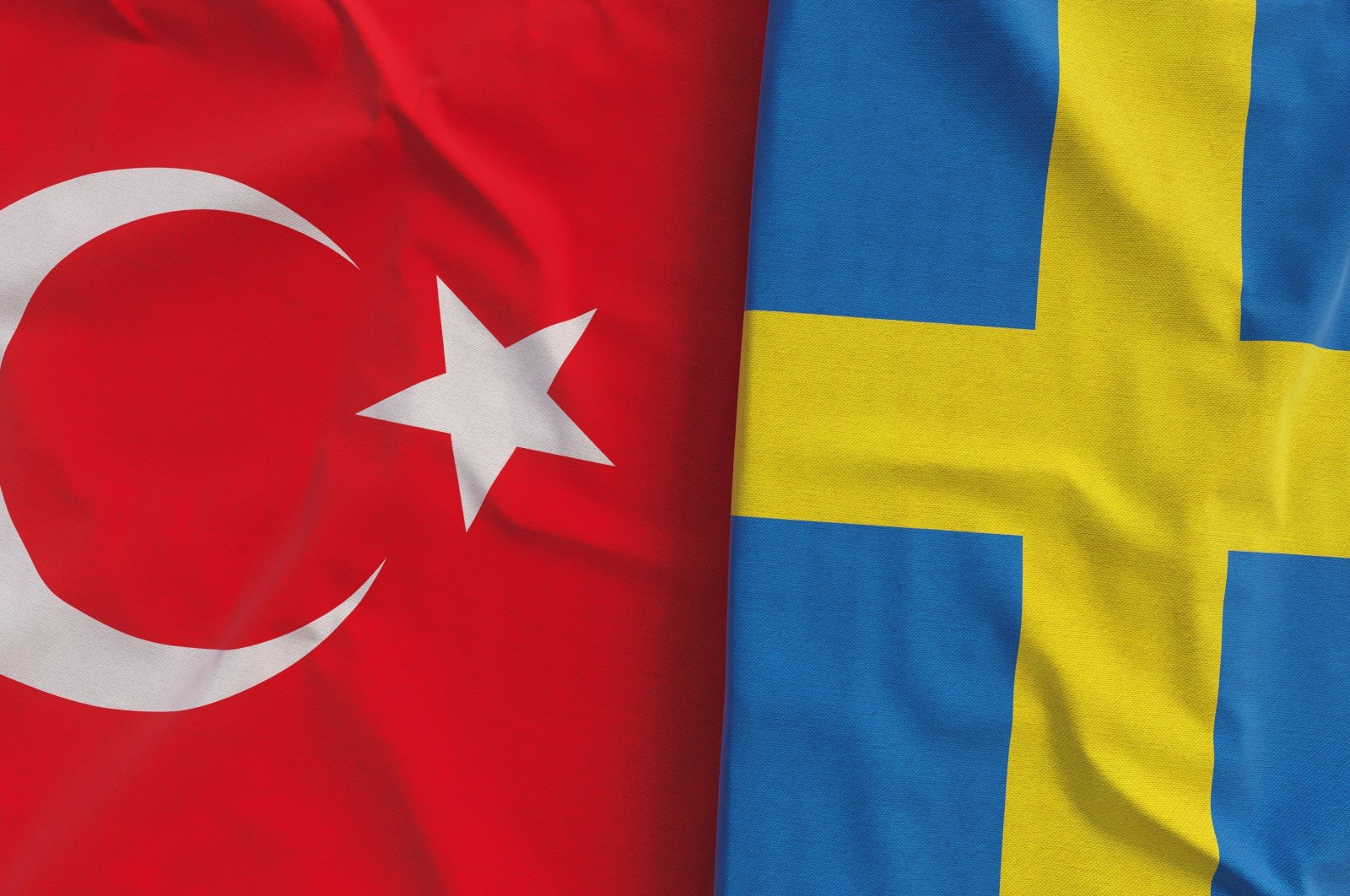 The flags of Türkiye and Sweden are seen in this undated photo. (Shutterstock Photo)