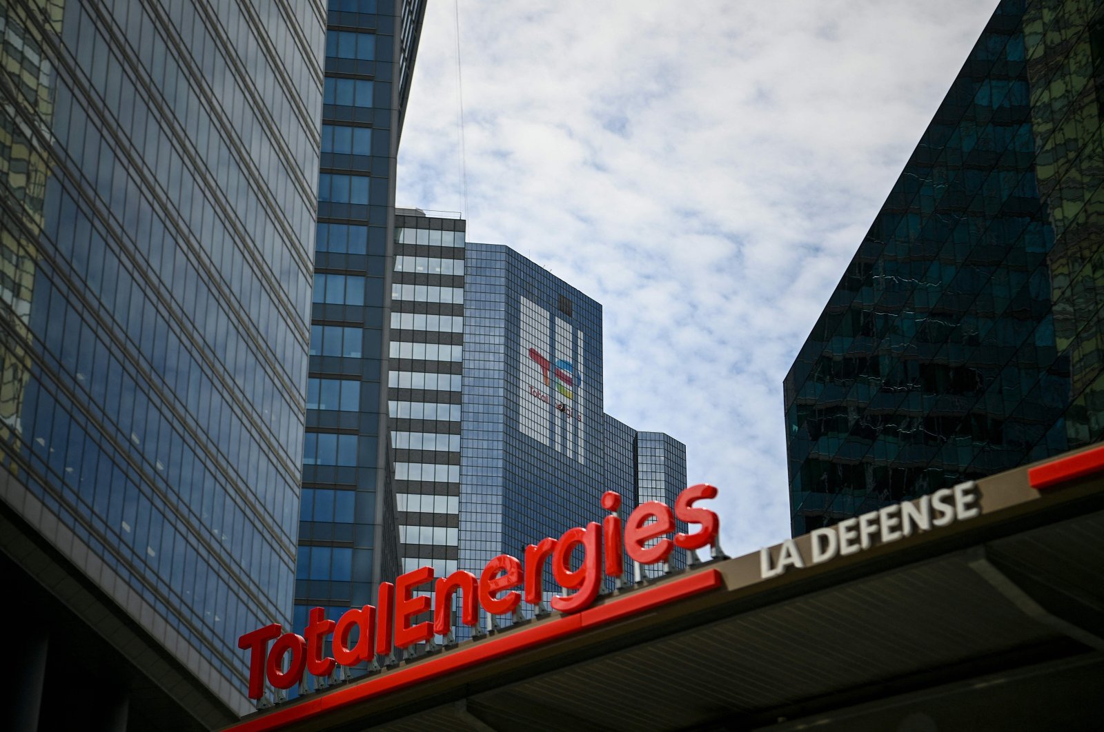 The TotalEnergies logo is seen during its unveling ceremony, at a charging station in La Defense on the outskirts of Paris, France, May 28, 2021. (AFP Photo)