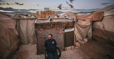 Abdulsamed Diyab is disabled due to an attack by the Syrian regime forces, Idlib, northwestern Syria, Oct. 27, 2022. (AA Photo)