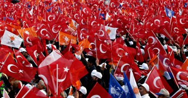 Turkish people during a meeting of the ruling Justice and Development Party's (AK Party) are seen in this undated photo, Türkiye. (Shutterstock Photo)