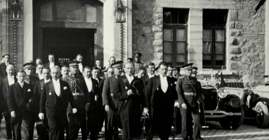 Mustafa Kemal Atatürk (C) attends Republic Day celebrations outside the Parliament, in the capital Ankara, Türkiye, Oct. 29, 1930. (AA Photo)