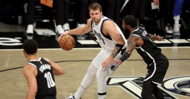 Dallas Mavericks guard Luka Doncic (77) controls the ball against Brooklyn Nets guard Kyrie Irving (11) and guard Ben Simmons (10) during the first quarter at the Barclays Center, Brooklyn, New York, U.S., Oct. 27, 2022. (Reuters Photo)