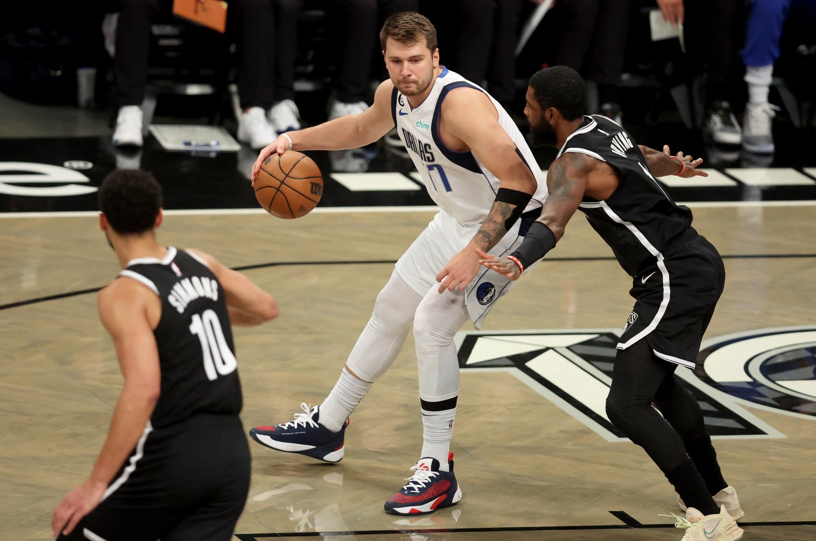 Dallas Mavericks guard Luka Doncic (77) controls the ball against Brooklyn Nets guard Kyrie Irving (11) and guard Ben Simmons (10) during the first quarter at the Barclays Center, Brooklyn, New York, U.S., Oct. 27, 2022. (Reuters Photo)