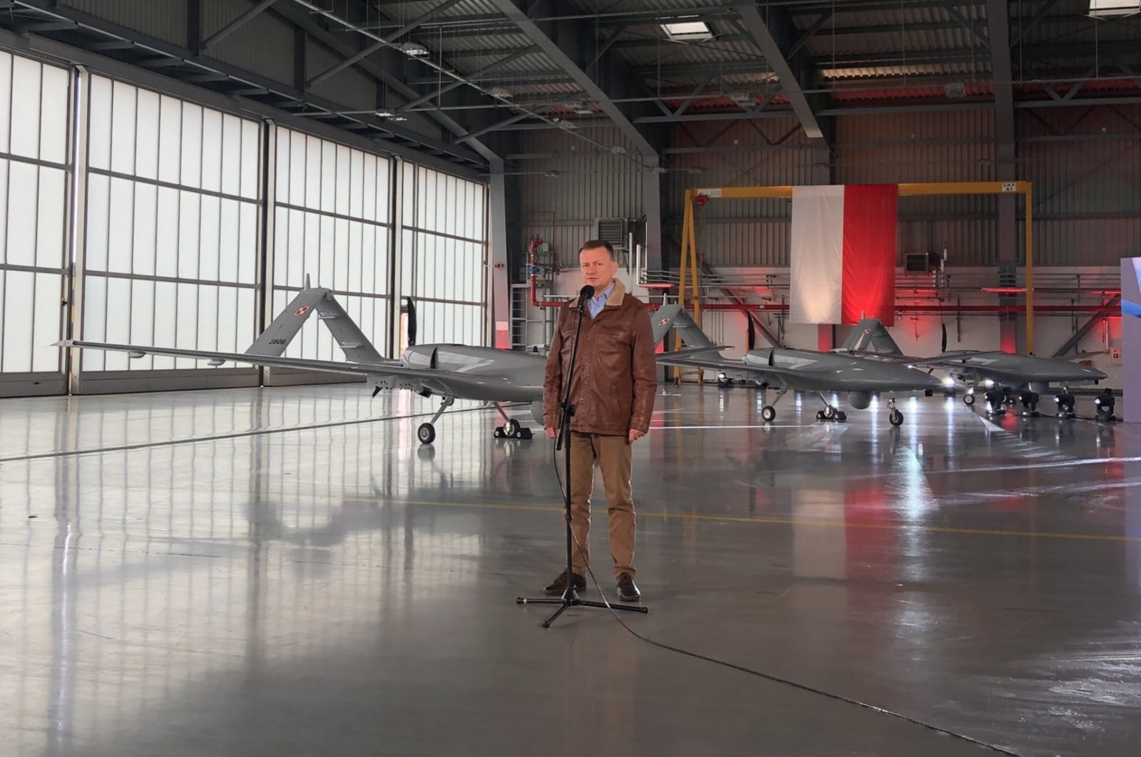Polish Deputy Prime Minister and Defense Minister Mariusz Blazczak speaks in front of the Polish Army&#039;s newly received Bayraktar TB2 drones at a military base in Miroslawiec, Poland, Oct. 28, 2022. (Photo: @Poland_MOD)