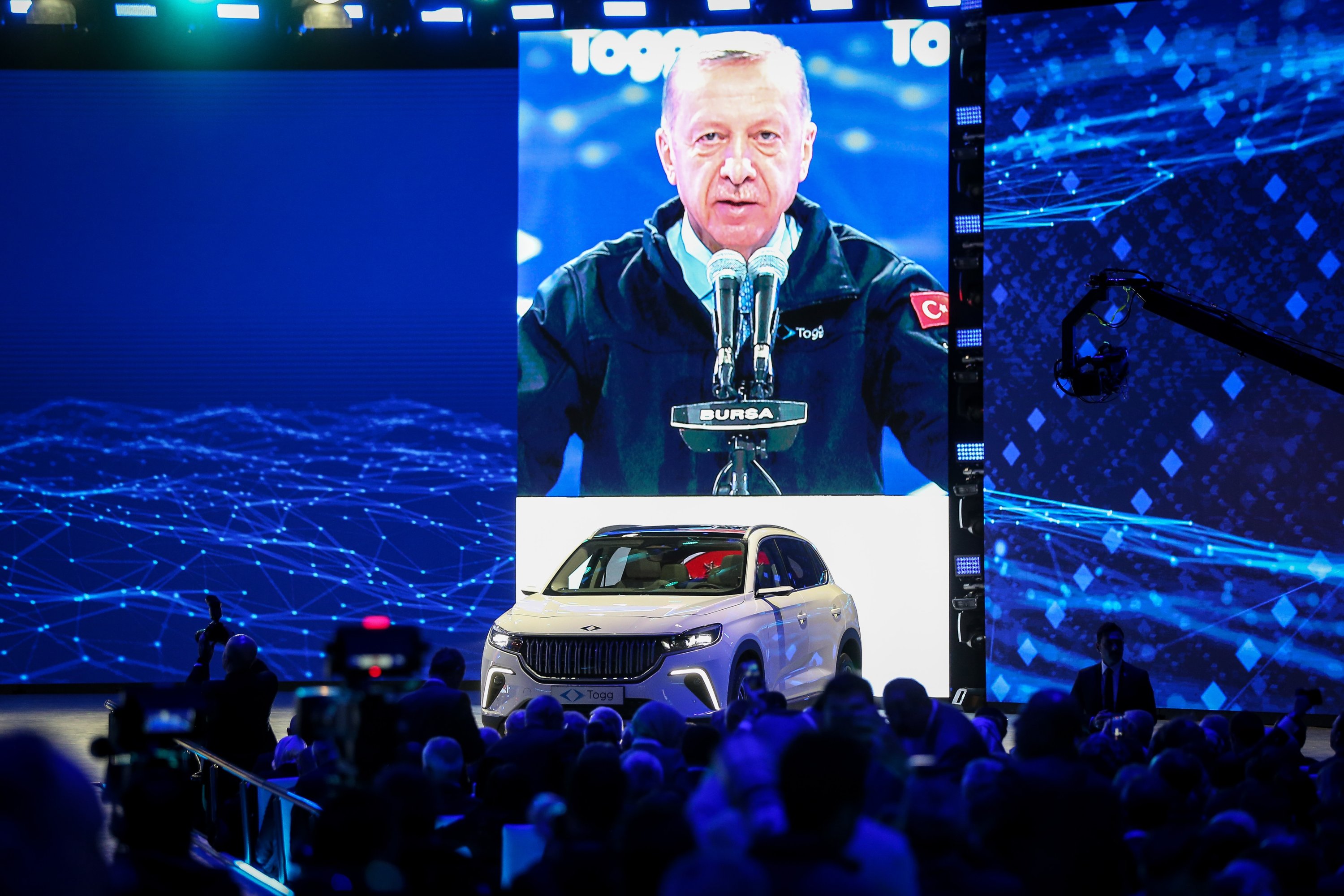 President Recep Tayyip Erdoğan speaks at the opening of the factory in Bursa, Turkey's first national automobile.  29, 2022. (AA Photo)