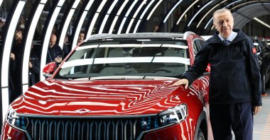 President Recep Tayyip Erdoğan poses for a photo during the inauguration of the plant for Türkiye's first automobile, in Bursa, Türkiye, Oct. 29, 2022. (AA Photo)
