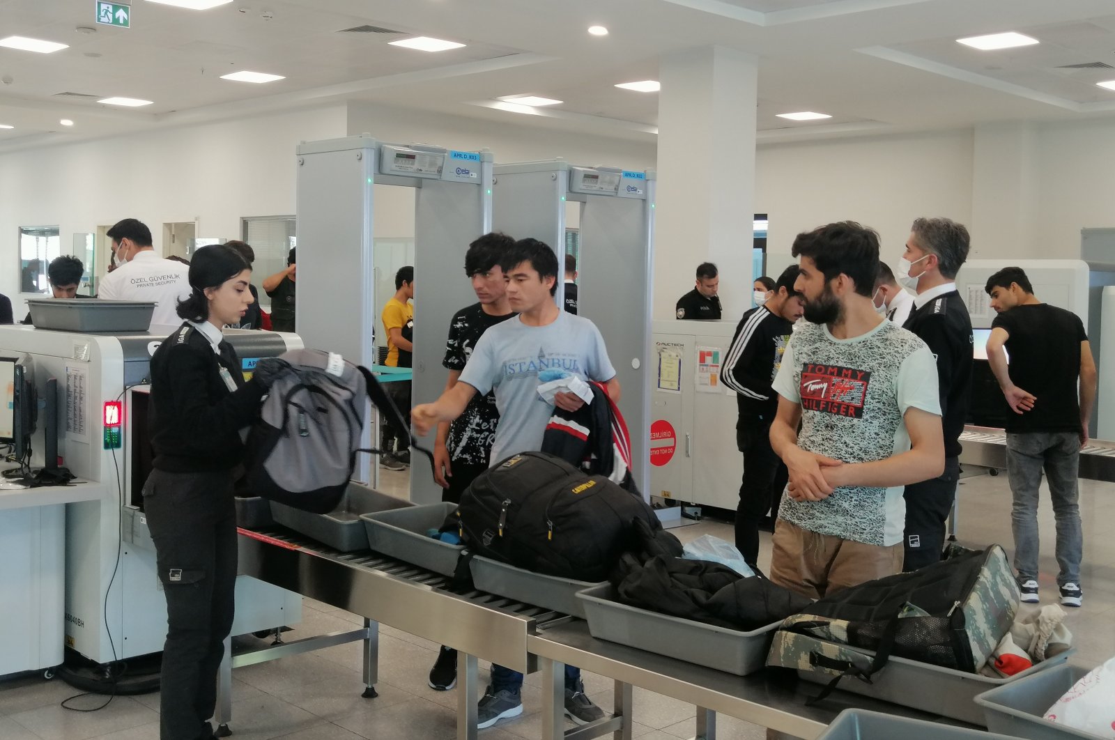 Türkiye deports illegal Afghan migrants to Afghanistan via charter flights at Istanbul Airport, Türkiye, Oct. 30, 2022. (IHA Photo)
