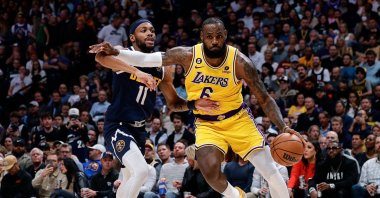 Los Angeles Lakers forward LeBron James (6) controls the ball as Denver Nuggets forward Bruce Brown (11) guards in the second quarter at Ball Arena, Denver, Colorado, U.S., Oct 26, 2022. (Reuters Photo)