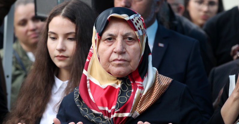 Mevlüde Genç (C), a surviving relative of the Solingen arson attack, prays during the commemoration ceremonies of the 25th anniversary of the xenophobic Solingen arson attack in Solingen, Germany, 29 May 2018.  (EPA Photo) 