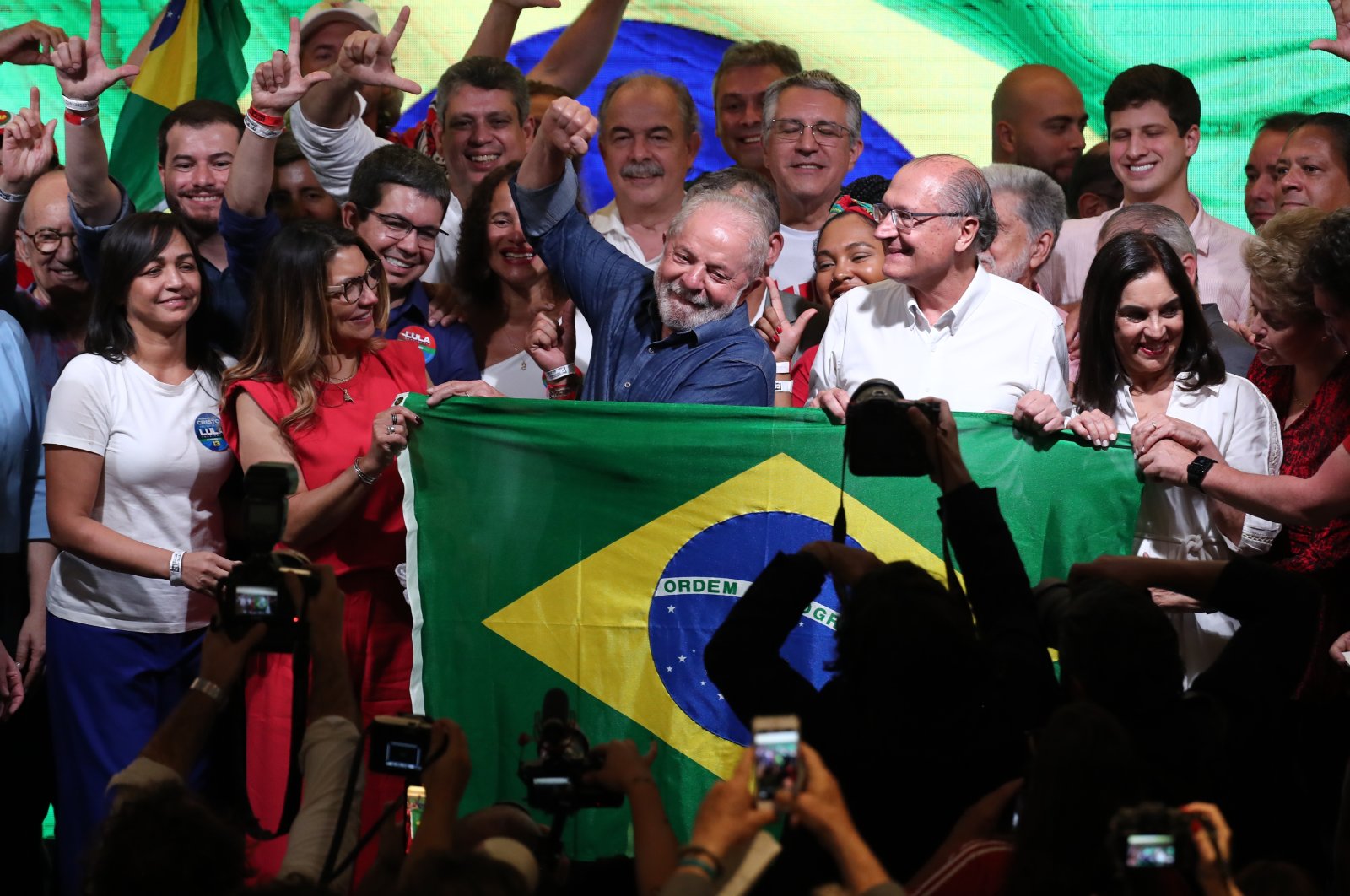 Former Brazilian President Luiz Inacio Lula da Silva waves alongside supporters after his victory in the presidential election, Sao Paulo, Brazil, Oct. 30, 2022. (EPA Photo)