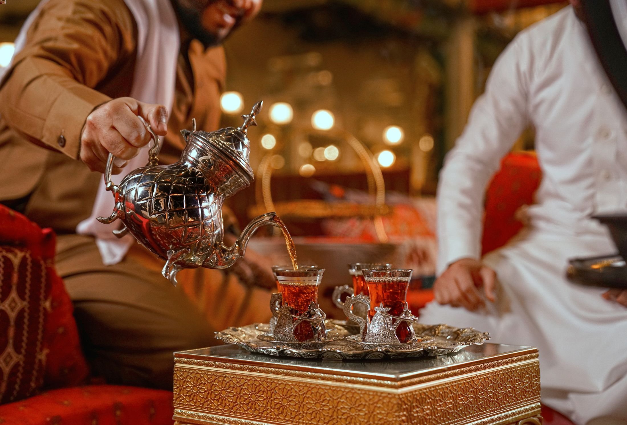 Traditional Arabic tea ceremony. (Shutterstock Photo)