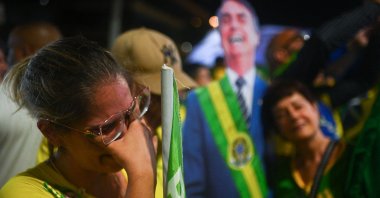 A Jair Bolsonaro supporter cries while watching the election results, Rio de Janeiro, Brazil, Oct. 30, 2022. (AFP Photo)
