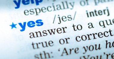 Close-up of word in English dictionary. (Shutterstock Photo)