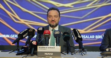 Mahmut Asmalı, the head of the Independent Industrialists and Businessmen's Association (MÜSIAD), and other executives during a meeting with press members in Istanbul, Türkiye, Oct. 13, 2022. (Courtesy of MÜSIAD)