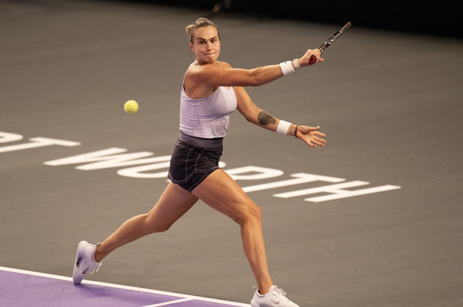 Aryna Sabalenka (BLR) returns a shot during her match against Ons Jabeur (TUN) on Day One of the WTA Finals at Dickies Arena, Forth Worth, Texas, U.S., Oct. 31, 2022. (Reuters Photo)