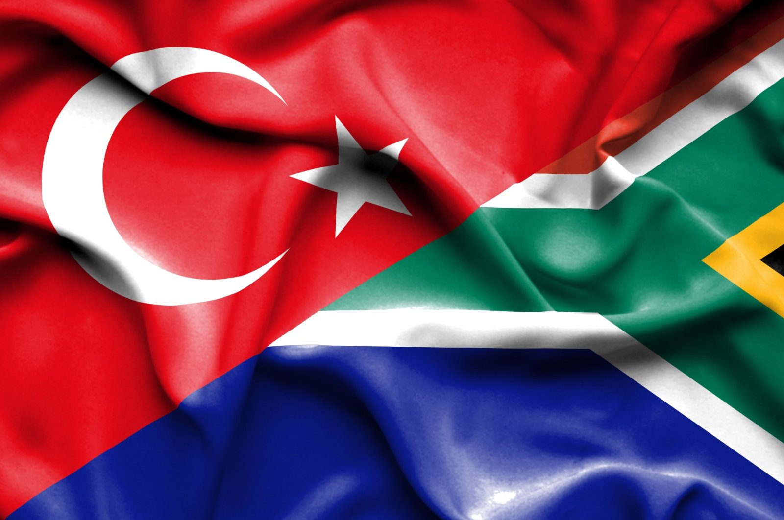 The Turkish and South African flags are seen together. (Shutterstock Photo)
