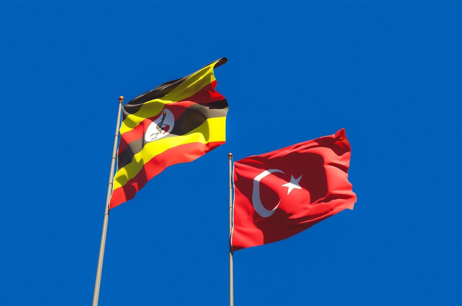 The Ugandan and Turkish flags fly at an unspecified location in this undated file photo. (Shutterstock File Photo)