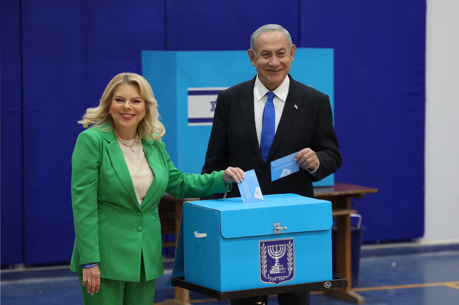 Former Israeli Prime Minister and leader of the Likud party Benjamin Netanyahu (R) and his wife Sara cast their ballots at a polling station, Jerusalem, Israel, Nov. 1, 2022. (EPA Photo)