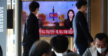 People watch a TV broadcasting a news report on North Korea firing a ballistic missile off its east coast, Seoul, South Korea, Nov. 2, 2022. (Reuters Photo)
