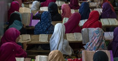 Afghan girls read the Quran in the Noor Mosque outside the city of Kabul, Afghanistan, Aug. 3, 2022. (AP Photo)