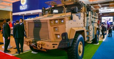Visitors examine the Turkish BMC armored vehicle Kirpi II 4x4 during the 2022 Indo Defense Expo in Jakarta, Nov. 2, 2022. (AFP Photo)
