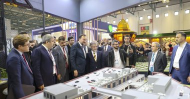 MÜSIAD Chairperson Mahmut Asmalı, Treasury and Finance Minister Nureddin Nebati and accompanying delegation visits booths at the MÜSIAD EXPO, Istanbul, Türkiye, Nov. 2, 2022. (AA Photo)