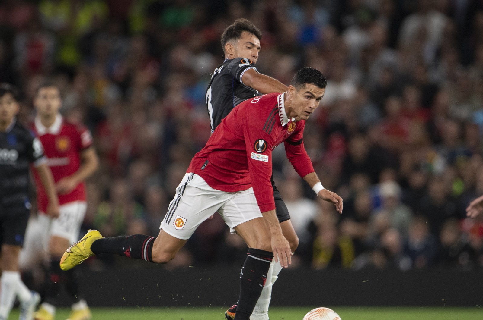 Manchester United&#039;s Cristiano Ronaldo and Real Sociedad&#039;s Martin Zubimendi in action during the UEFA Europa League Group E match between Manchester United and Real Sociedad at Old Trafford, Manchester, United Kingdom, Sept. 8, 2022. (Getty Images Photo)