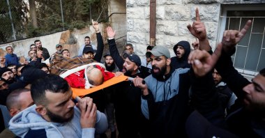 People carry the body of Palestinian Daoud Rayan killed in an Israeli raid in Bayt Duqu, occupied West Bank, Palestine, Nov. 3, 2022. (Reuters Photo)