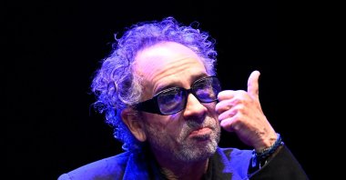 Film director Tim Burton gestures as he attends a news conference during the Lucca Comics and Games for the premiere of Netflix's new series "Wednesday," in Lucca, Italy, Oct. 31, 2022. (Reuters Photo)