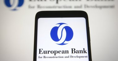 The European Bank for Reconstruction and Development (EBRD) logo is seen on a mobile phone screen, Kyiv, Ukraine, Nov. 4, 2021. (Shutterstock Photo)
