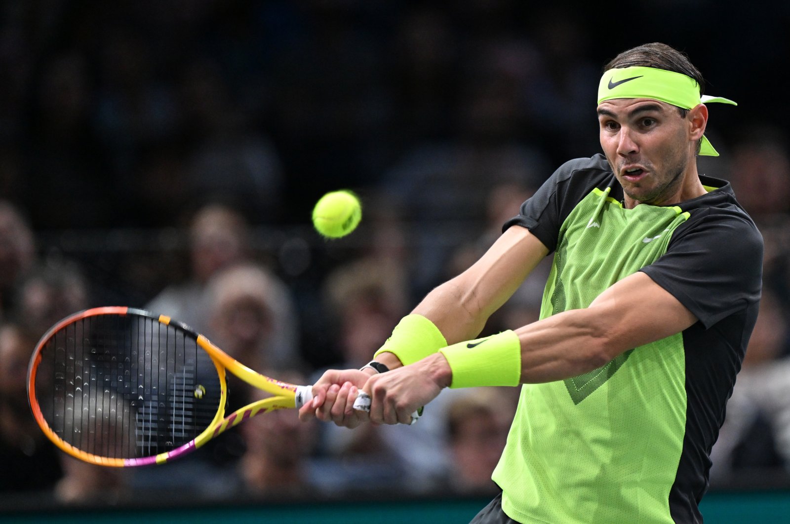 Spain&#039;s Rafael Nadal plays a backhand return during the men&#039;s singles round of 16 tennis match against U.S.&#039; Paul Tommy on day three of the ATP World Tour Masters 1000 - Paris Masters (Paris Bercy) tennis tournament at The AccorHotels Arena, Paris, France, Nov. 2, 2022. (AFP)