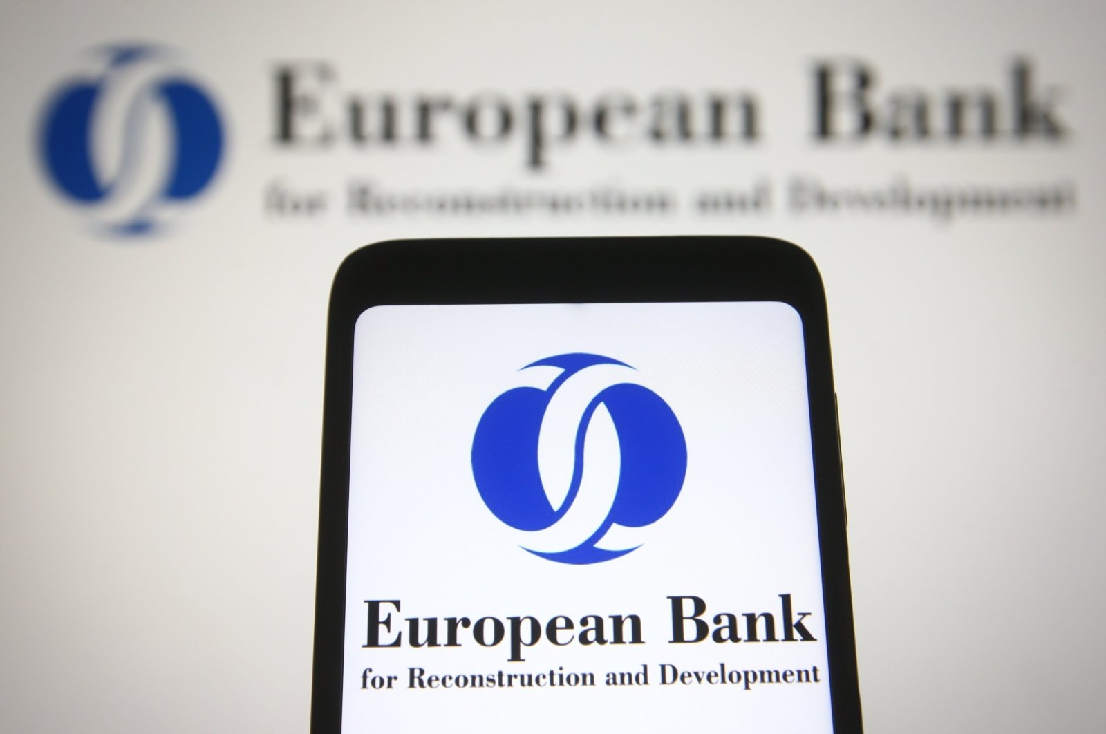 The European Bank for Reconstruction and Development (EBRD) logo is seen on a mobile phone screen, Kyiv, Ukraine, Nov. 4, 2021. (Shutterstock Photo)