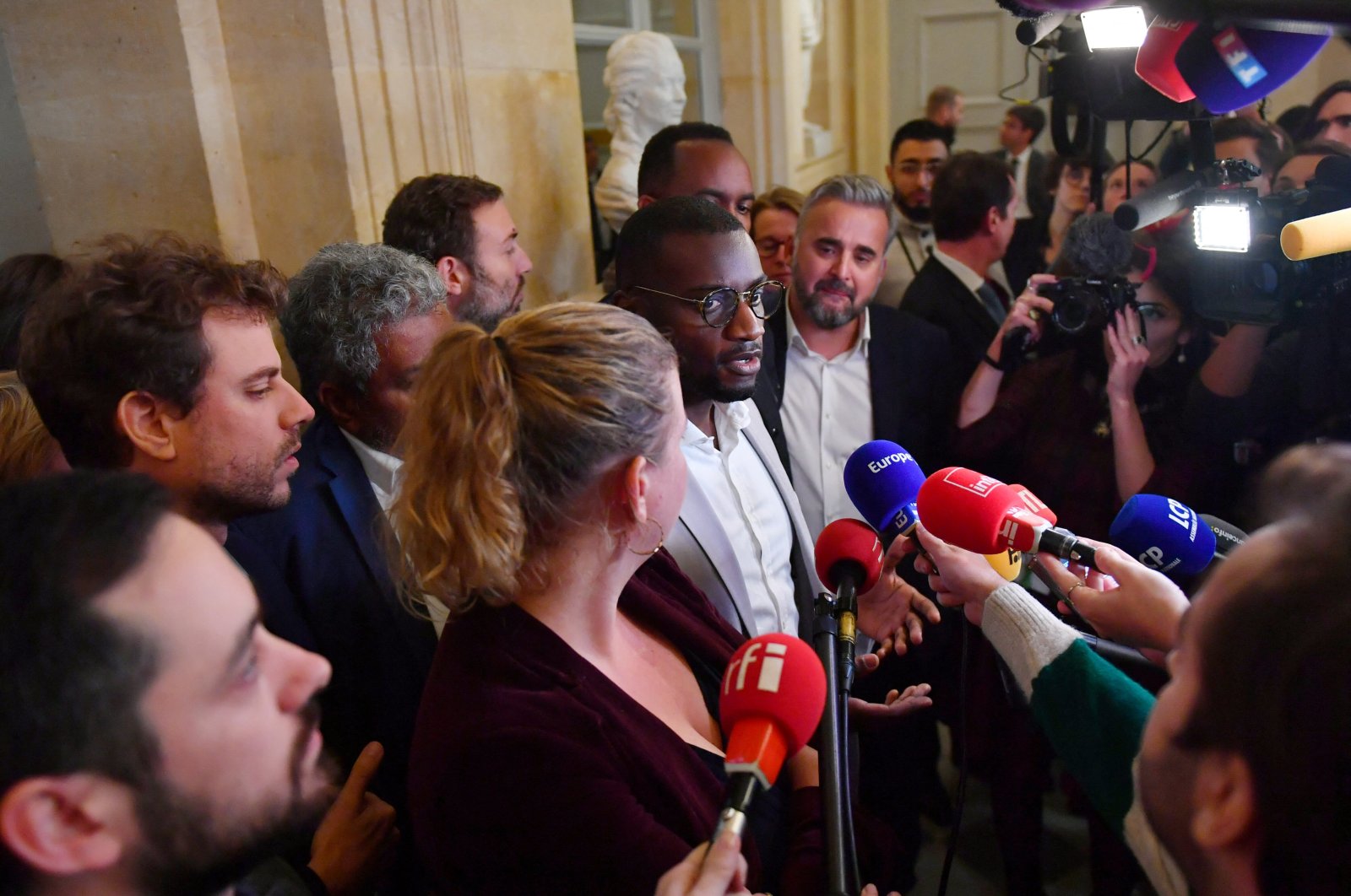 Carlos Martens Bilongo of the leftist France Unbowed party (LFI) speaks to journalists following the exit of questions to the government session at the National Assembly in Paris, France, Nov. 3, 2022. (Reuters Photo)