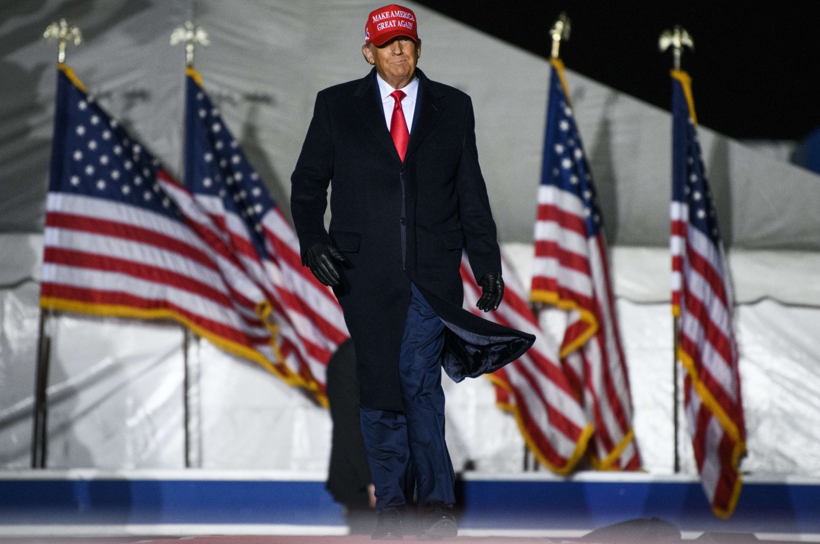 Former U.S. President Donald Trump arrives during a campaign event in Sioux City, Iowa, U.S., Nov. 3, 2022. (AFP Photo)