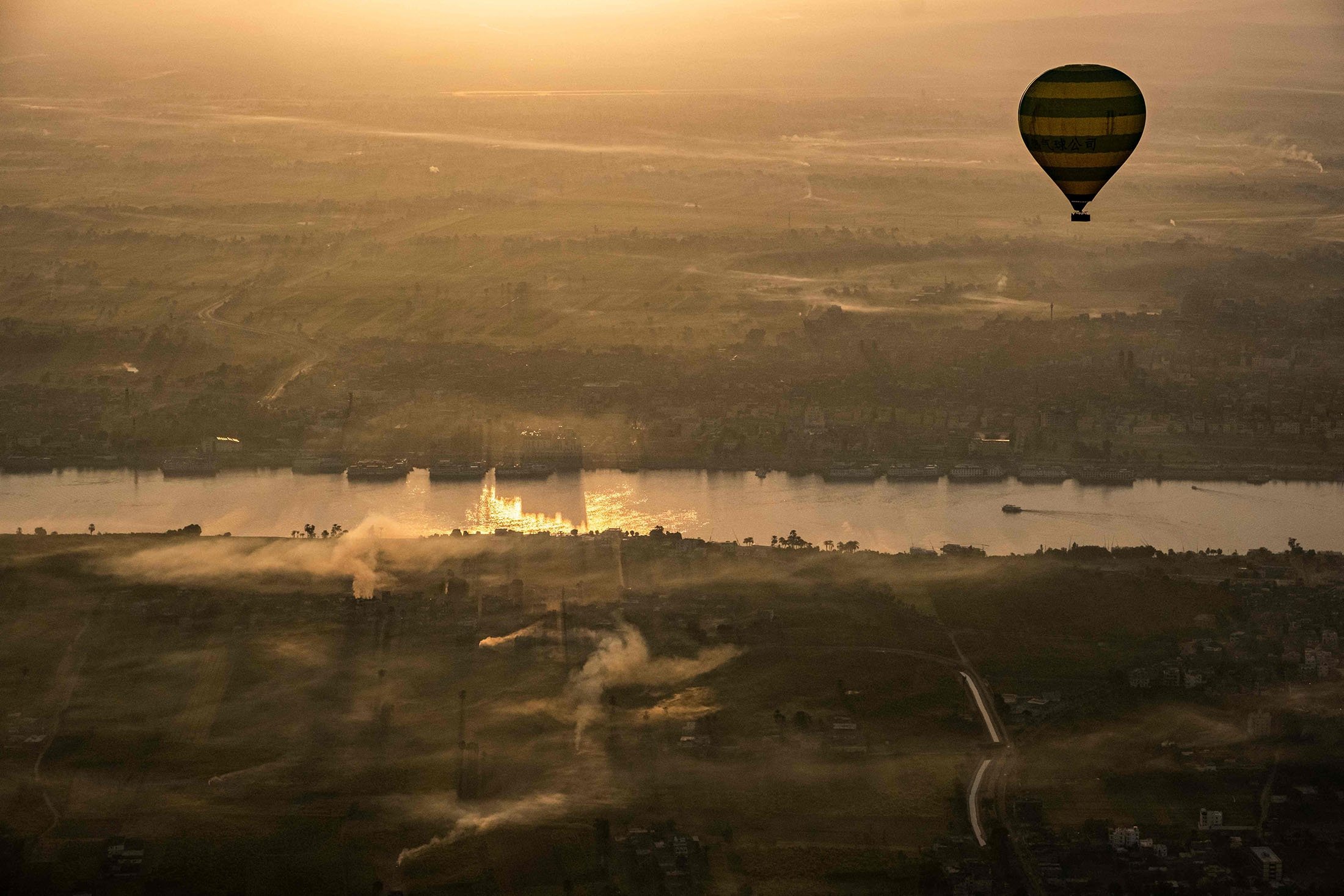 An aerial view from a hot air balloon of the Nile river waters off of the southern city of Luxor, Egypt, Jan. 18, 2022. (AFP Photo)