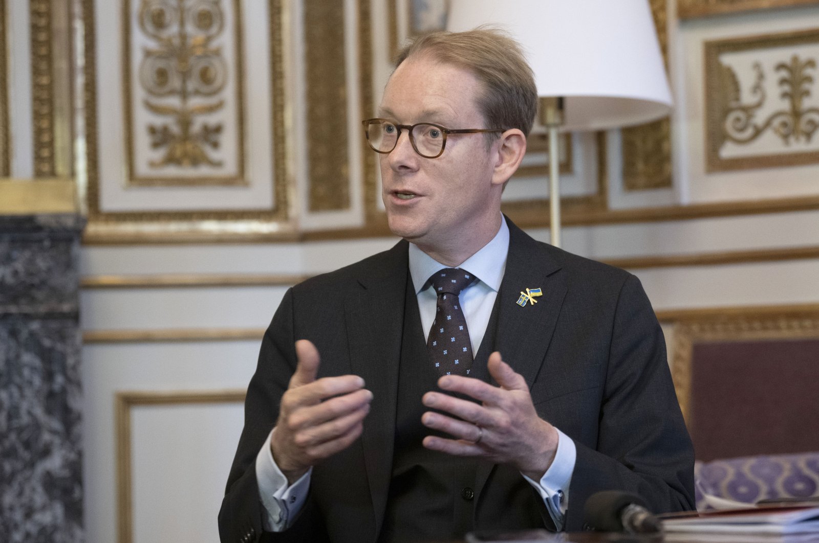 Swedish Foreign Minister Tobias Billström speaks during an interview with the Associated Press at the Ministry of Foreign Affairs in Stockholm, Sweden, Monday, Oct. 24, 2022. (AP Photo)