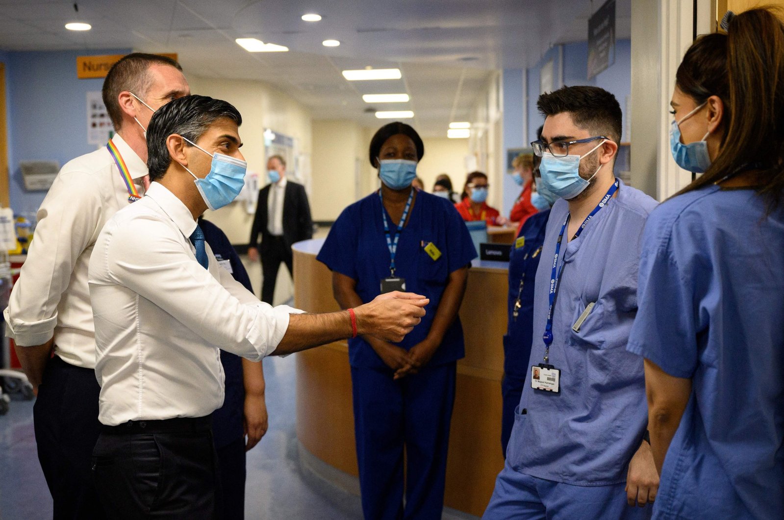 British Prime Minister Rishi Sunak (L) speaks with nursing staff during his visit to Croydon University Hospital in south London, U.K., Oct. 28, 2022. (AFP Photo)