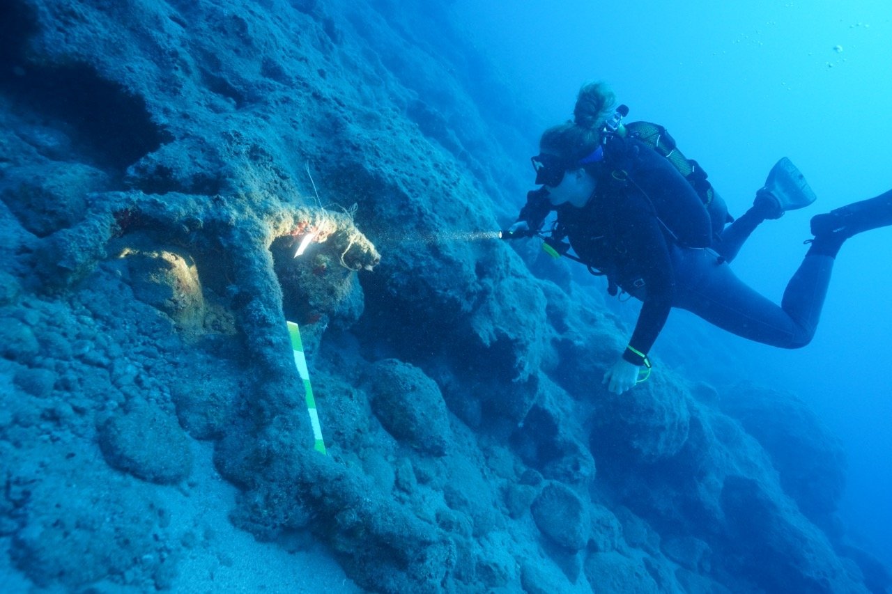 A member of the exploration team examines remnants from a shipwreck, in Antalya, Türkiye, Nov. 6, 2022. (AA Photo)