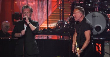 Musicians John Mellencamp (L) and Bruce Springsteen (R) perform during the 37th Annual Rock and Roll Hall of Fame induction ceremony at the Microsoft Theater, Los Angeles, California, U.S., Nov. 5, 2022. (AFP Photo)