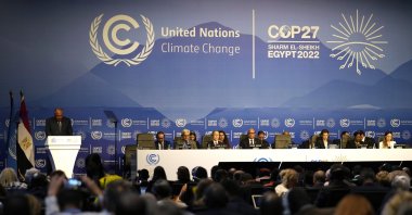 Sameh Shoukry (L), president of the COP27 climate summit, speaks during an opening session at the COP27 U.N. Climate Summit, in Sharm el-Sheikh, Egypt, Nov. 6, 2022. (AP Photo)