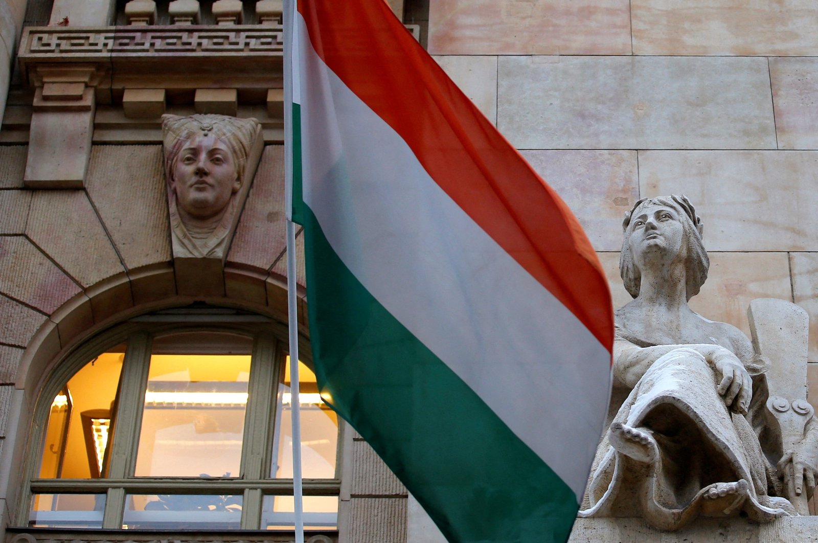 The Hungarian national flag flies on the building of the National Bank of Hungary in Budapest, Hungary, Jan. 10, 2013. (Reuters Photo)