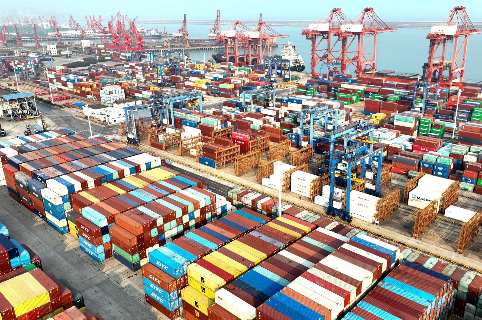 Containers are seen stacked at a port in Lianyungang in China&#039;s eastern Jiangsu province, Nov. 7, 2022. (AFP Photo)