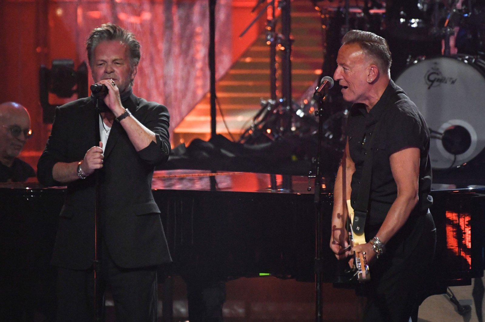 Musicians John Mellencamp (L) and Bruce Springsteen (R) perform during the 37th Annual Rock and Roll Hall of Fame induction ceremony at the Microsoft Theater, Los Angeles, California, U.S., Nov. 5, 2022. (AFP Photo)