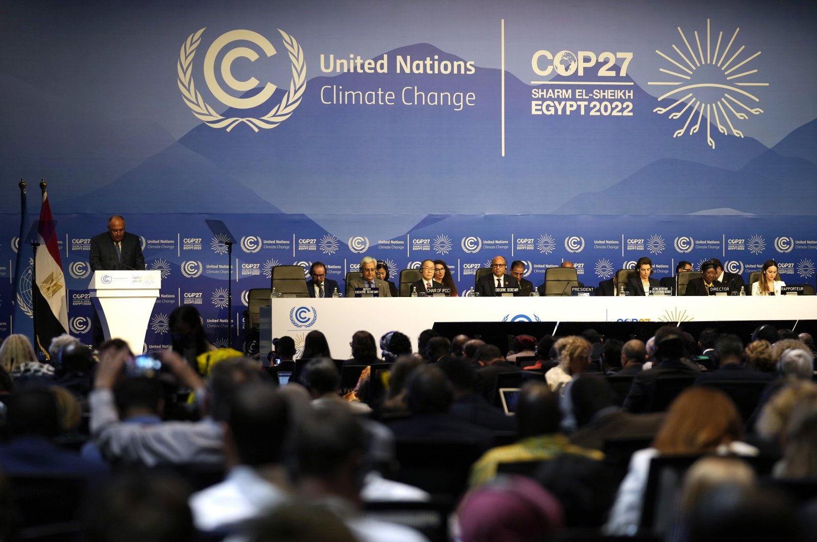 Sameh Shoukry (L), president of the COP27 climate summit, speaks during an opening session at the COP27 U.N. Climate Summit, in Sharm el-Sheikh, Egypt, Nov. 6, 2022. (AP Photo)