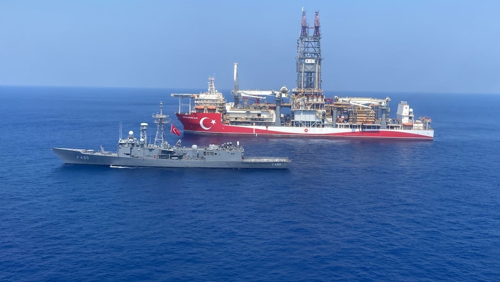 Türkiye&#039;s Abdülhamid Han, an ultra-deepwater drillship, is escorted by a Turkish navy frigate in the Eastern Mediterranean, Aug. 11, 2022. (IHA Photo)