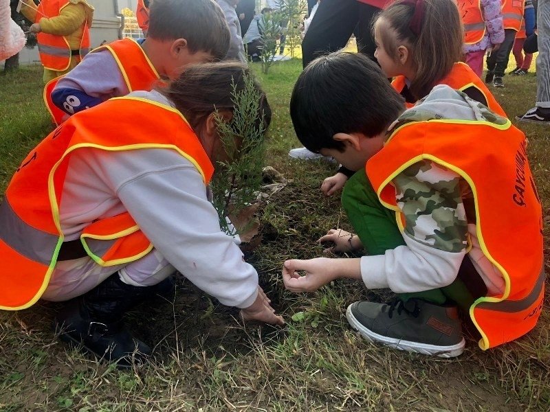 Children plant a sapling at an event in Zonguldak, northern Türkiye, Nov. 8, 2022. (İHA Photo)