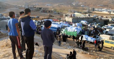 Syrian refugees prepare to leave Lebanon toward Syrian territory through the Wadi Hamid crossing in Arsal, Lebanon, Oct. 26, 2022. (AFP Photo)