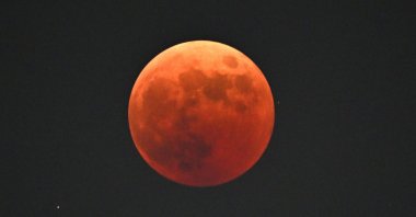 The blood moon is seen during a total lunar eclipse in Goyang, northwest of Seoul, South Korea, Nov. 8, 2022. (AFP Photo)